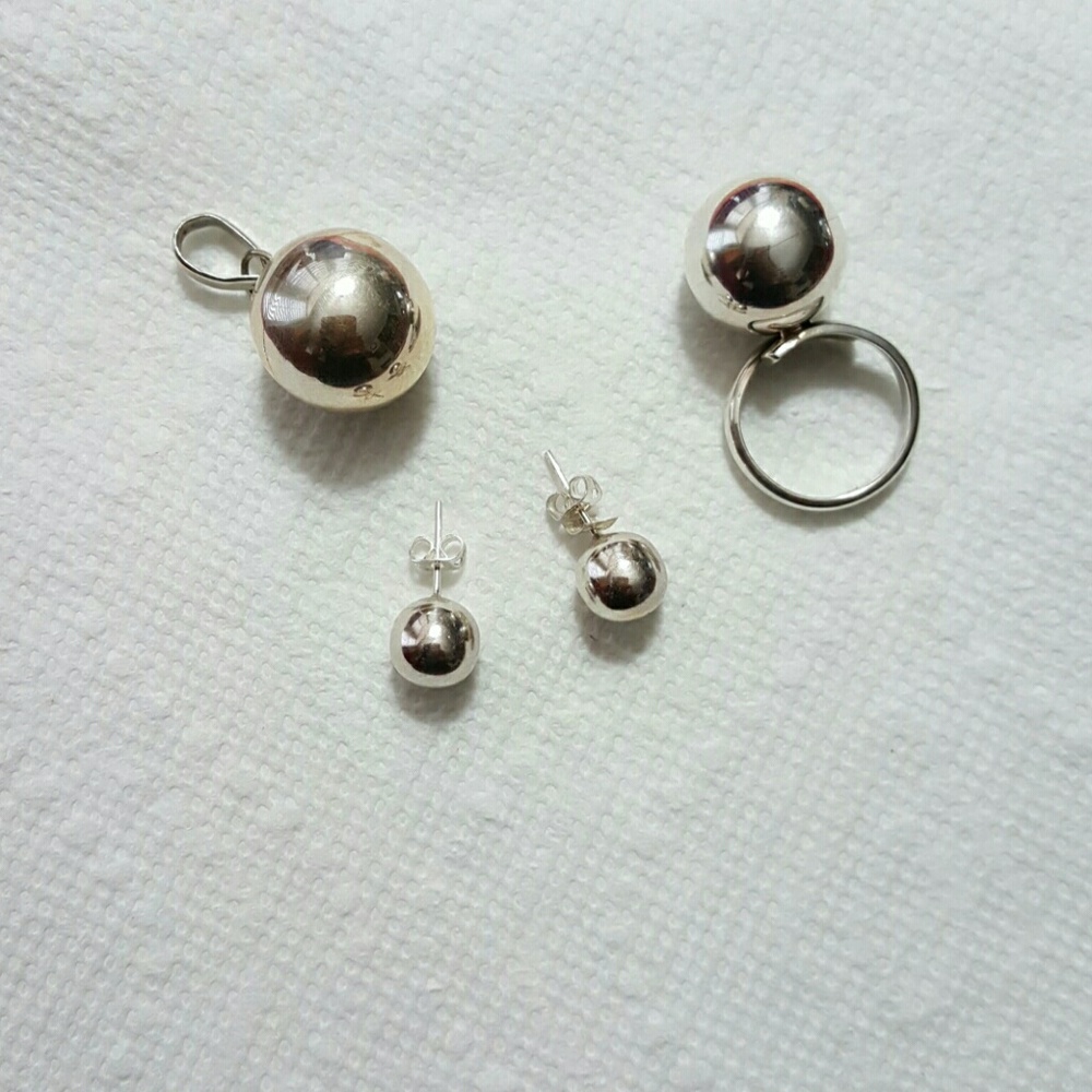 Harmony Ball chime Sterl Ring & Pendent, earning